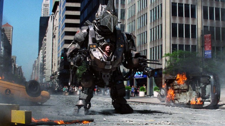 Rhino standing in the middle of the street guns blazing in Amazing Spider-Man 2