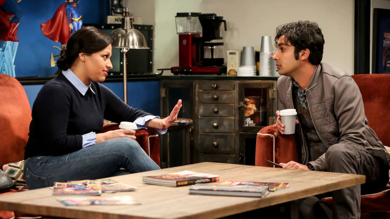 Anu and Raj talking in his living room on The Big Bang Theory