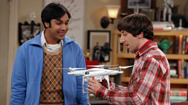 Raj and Howard looking at a drone in The Big Bang Theory