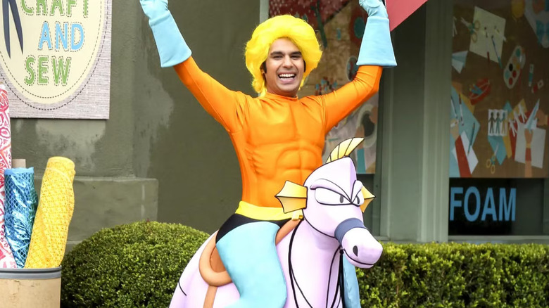 Raj raising his arms in joy in an Aquaman costume in The Big Bang Theory
