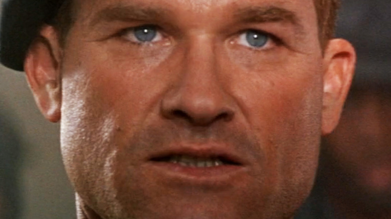 Kurt Russell's Jack O'Neill is seen in closeup in Stargate