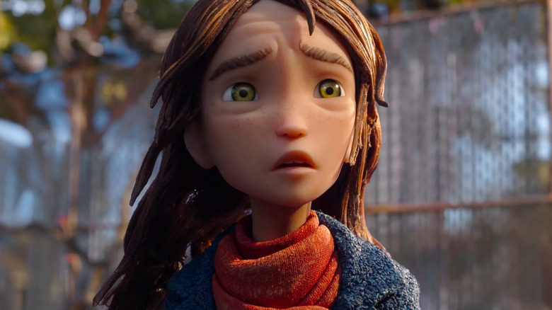 Peyton Elizabeth Lee as the voice of Prue McKeel standing outside with a look of concern on her face in Wildwood