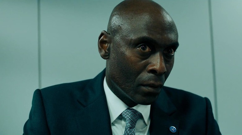 Reddick looking concerned in a suit in Angel Has Fallen