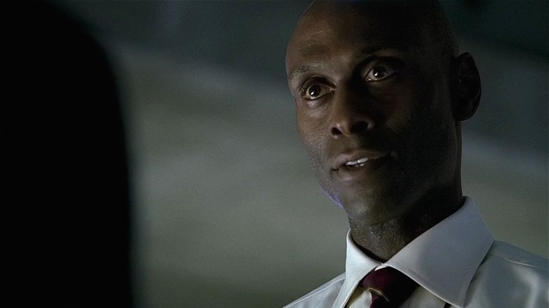Reddick as Broyles in Fringe wearing white shirt and tie