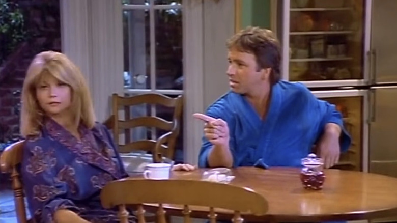 Markie Post's Georgie Anne Lahti sits with John Ritter's John Hartman at a table in Hearts Afire