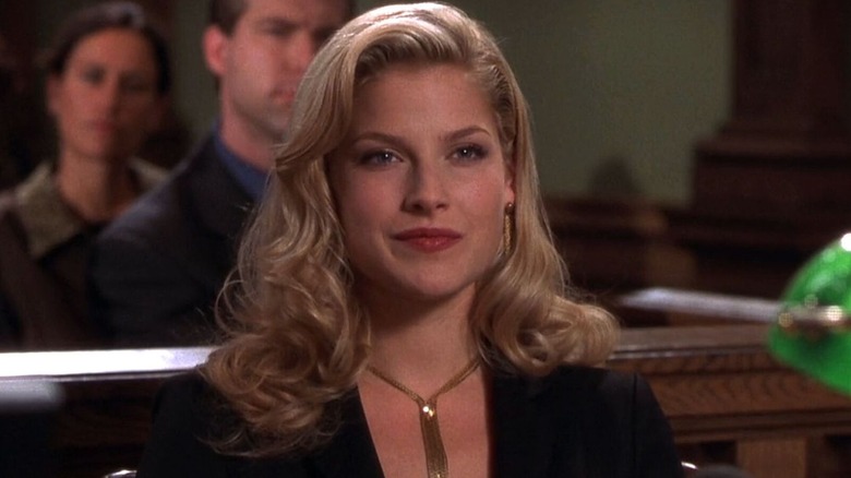 Brooke smiling in a courtroom in 