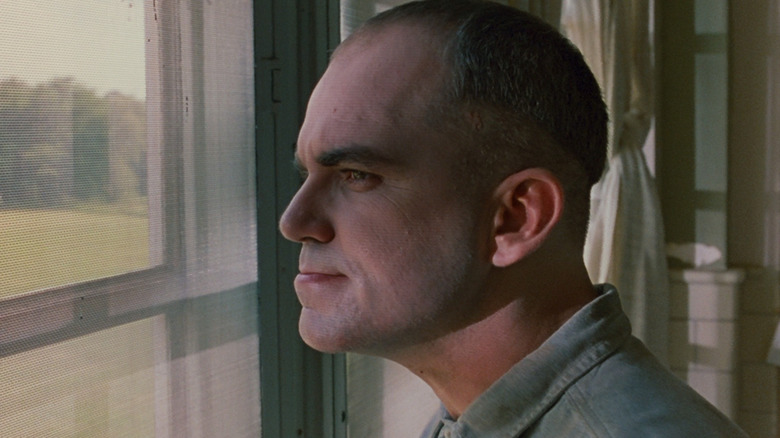 Karl staring out a window in Sling Blade