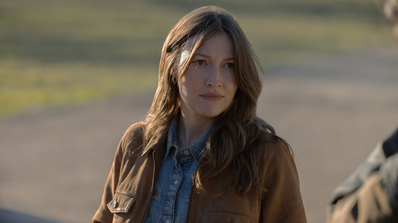 Kelly Macdonald's Kerry Kane is seen standing outside in Lanterns