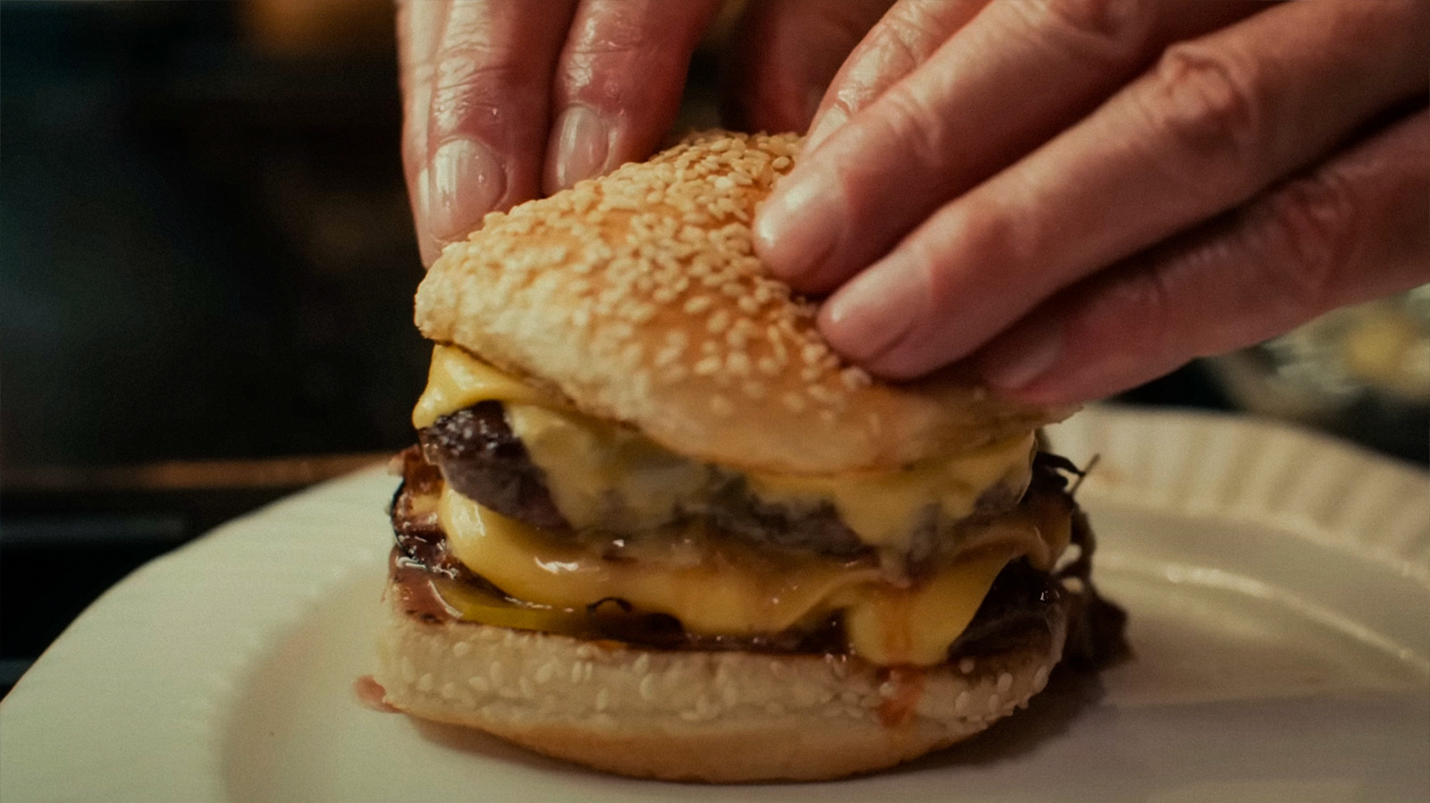 https://www.slashfilm.com/img/gallery/learn-how-to-make-that-delicious-cheeseburger-from-the-menu-thanks-to-binging-with-babish/l-intro-1675042404.jpg