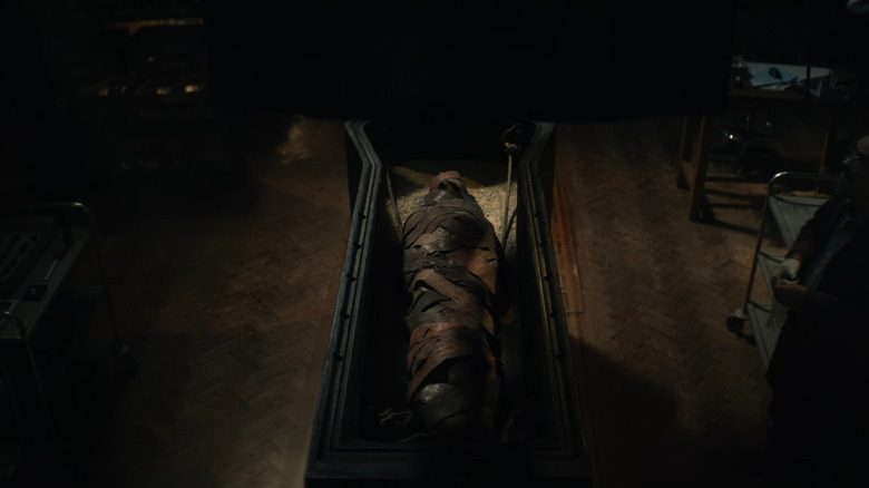 An overhead shot of the sarcophagus in Lee Cronin's The Mummy