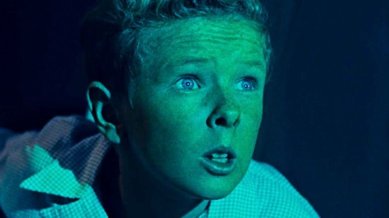 Jimmy Hunt's David MacLean is seen looking awed in closeup in Invaders from Mars