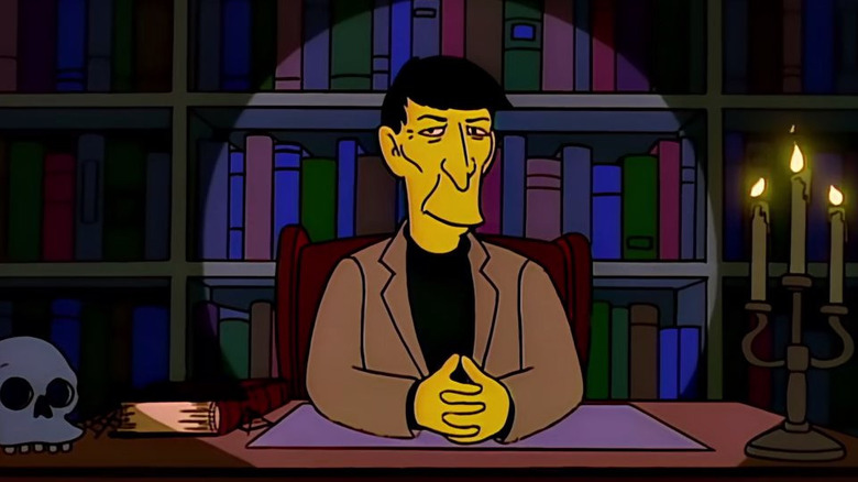 Leonard Nimoy as himself sitting at a desk in The Simpsons