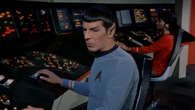 Spock at the science station on the Enterprise on Star Trek
