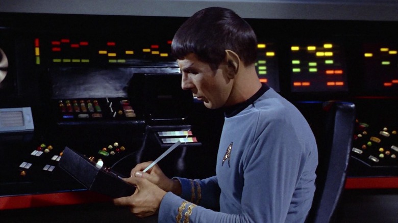 Spock working at the science station on the Enterprise on Star Trek