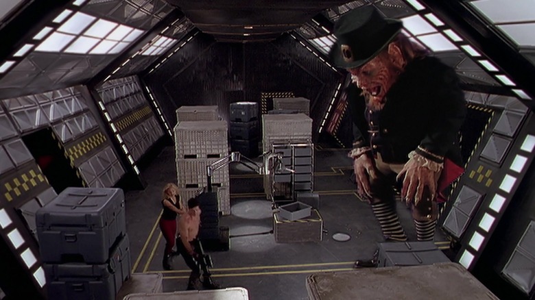 Warwick Davis as Lubdan, enjoying his large size in Leprechaun 4: In Space
