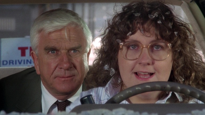 Leslie Nielsen and Winifred Freedman in The Naked Gun 