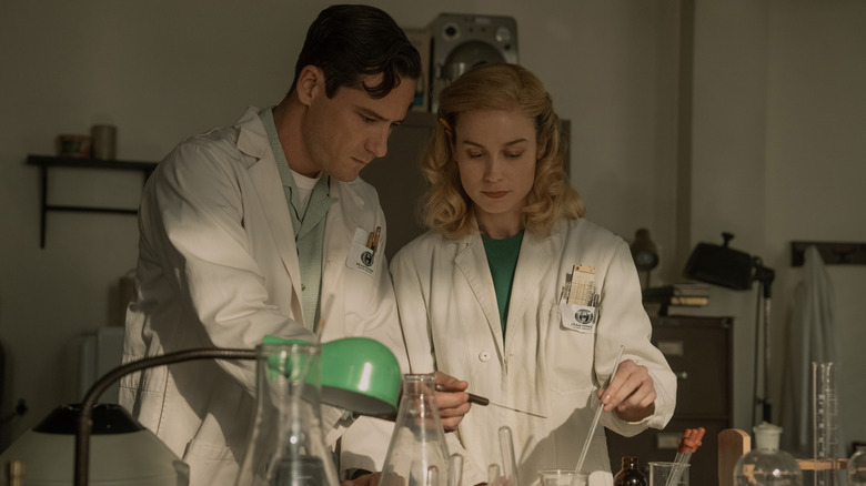 Calvin and Elizabeth working together in the lab in Lessons in Chemistry