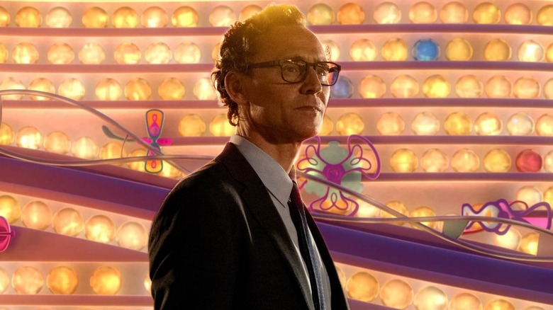 Tom Hiddleston as Chuck from Life of Chuck stood in front of the memory bank from Inside Out
