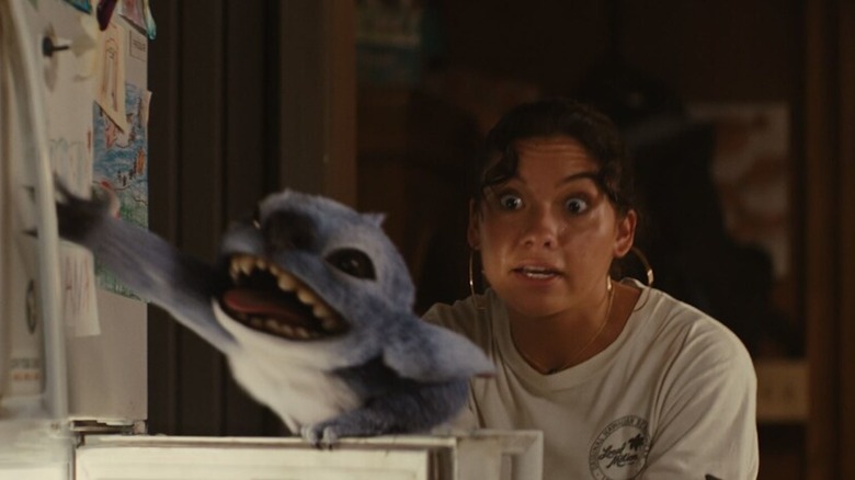 Sydney Agudong contends with a refrigerator raiding Stitch in Lilo & Stitch