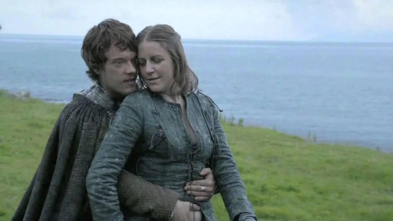Theon and Yara Greyjoy get a little too close for brother and sister atop a horse on Game of Thrones.