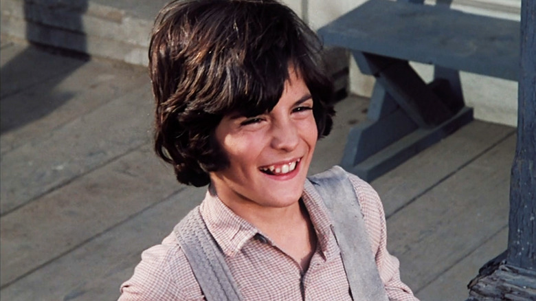 Matthew Labyorteaux's Albert smiles as he stands outside in Little House on the Prairie