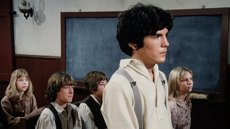 Matthew Labyorteaux's Albert stands up in his classroom in Little House on the Prairie