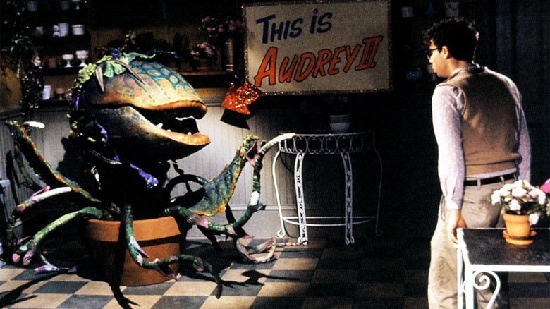 Rick Moranis and Audrey II in Little Shop of Horrors