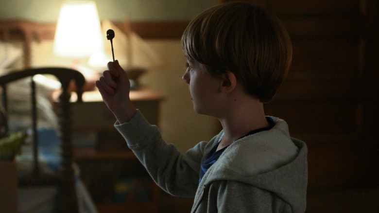 Jackson Robert Scott holding key