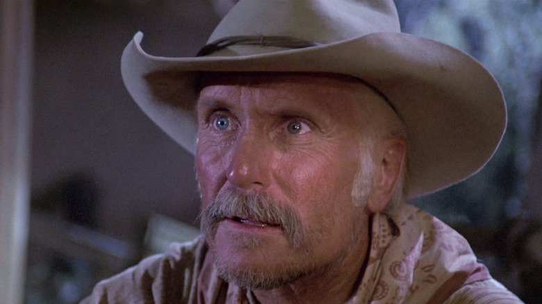 Robert Duvall as Gus McCrae wearing a cowboy hat in Lonesome Dove