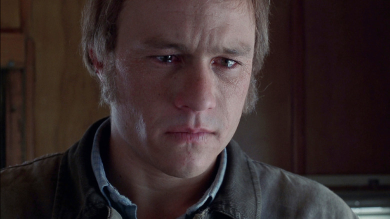 Heath Ledger as older Ennis Del Mar with tears in his eyes in Brokeback Mountain