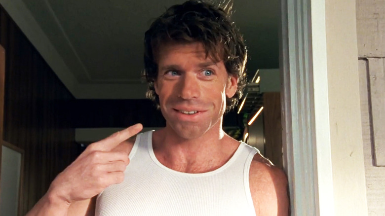 Taylor Sheridan's Danny Boyd points to his own face while standing in a doorway in Veronica Mars