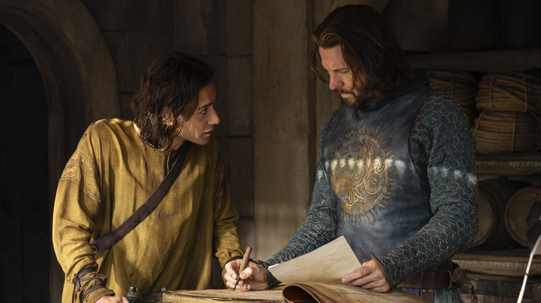 Isildur and Elendil at a table