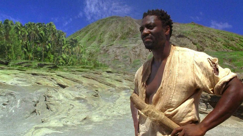 Mr. Eko carries his stick as he walks across the Island on Lost