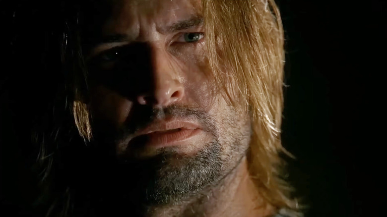 Josh Holloway as Sawyer looking distrustful in Lost