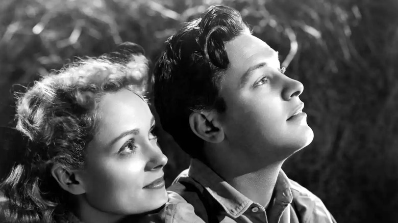 Martha Scott als Emily Webb en William Holden als George Gibbs staren naar de hemel in Our Town