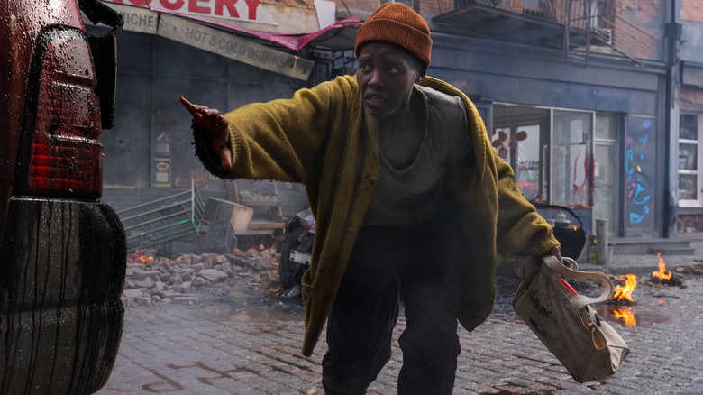 Sam freaking out at a bloody car bumper in A Quiet Place: Day One