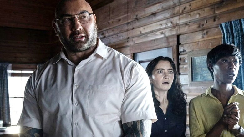 Dave Bautista, Abby Quinn, and  Nikki Amuka-Bird in Knock at the Cabin