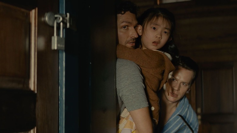 Ben Aldridge, Kristen Cui, and Jonathan Groff in Knock at the Cabin