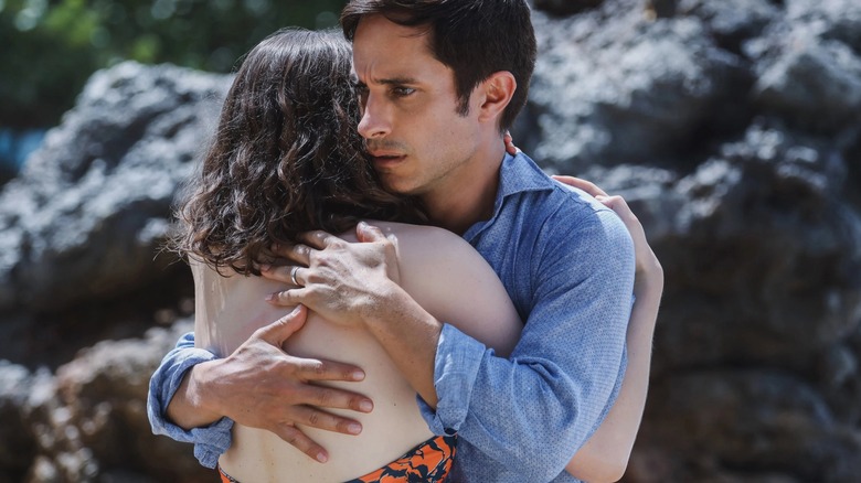 Gael García Bernal's Guy hugs his daughter Maddox in Old