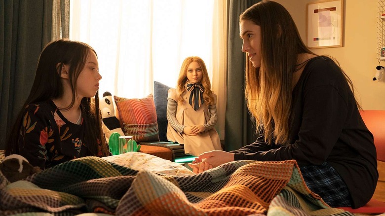 Violet McGraw, M3GAN, and Allison Williams