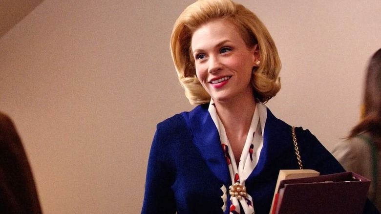Betty at college, books in hand, on Mad Men