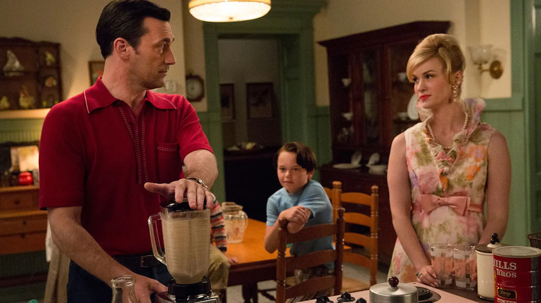 Don and Betty stand in their kitchen while Bobby looks on in Mad Men