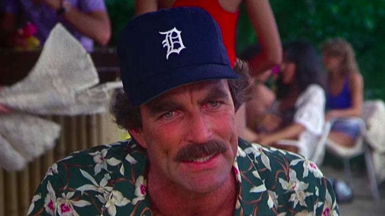 Magnum P.I. Tom Selleck wearing a baseball cap