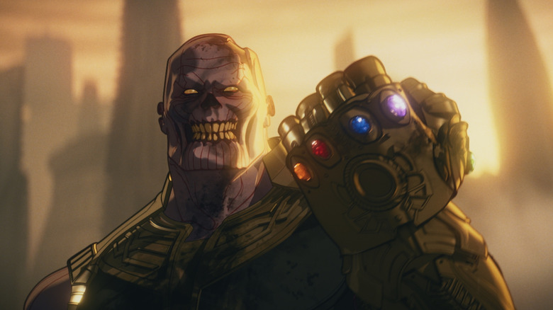 Zombie Thanos raises his fist as he wears the Infinity Gauntlet possessing all the Infinity Stones in Marvel Zombies