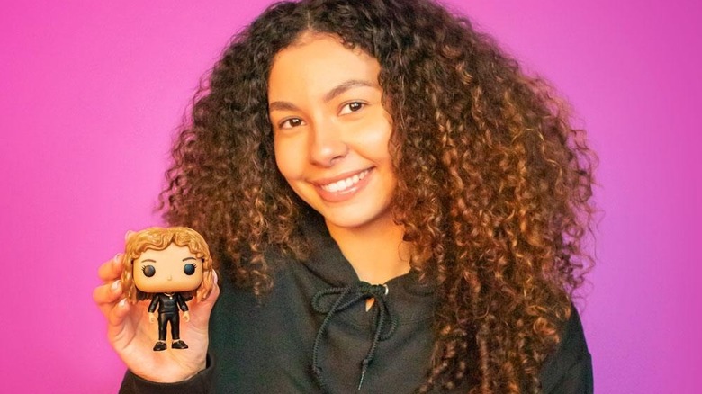 Woman holding Funko