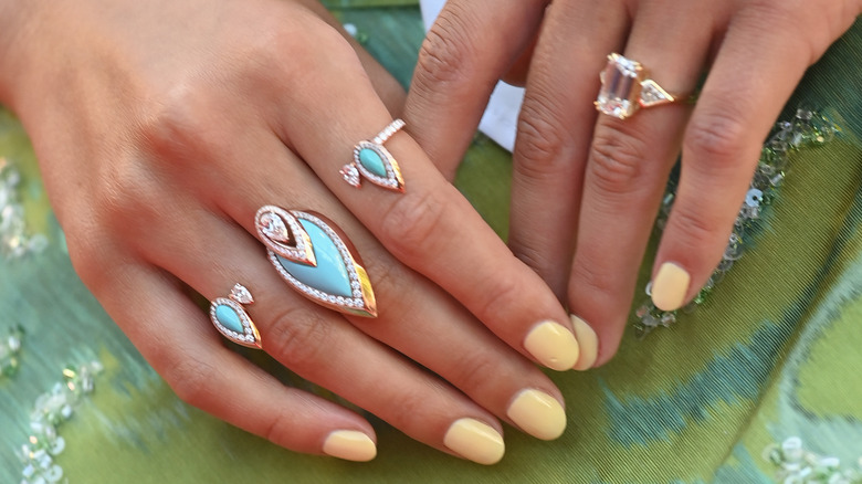 Woman with yellow nails