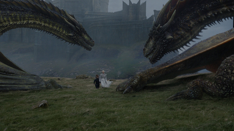Daenerys and Tyrion approaching the dragons on Game of Thrones