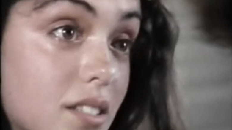 Kathleen Beller's Kate is seen in closeup in Surfacing