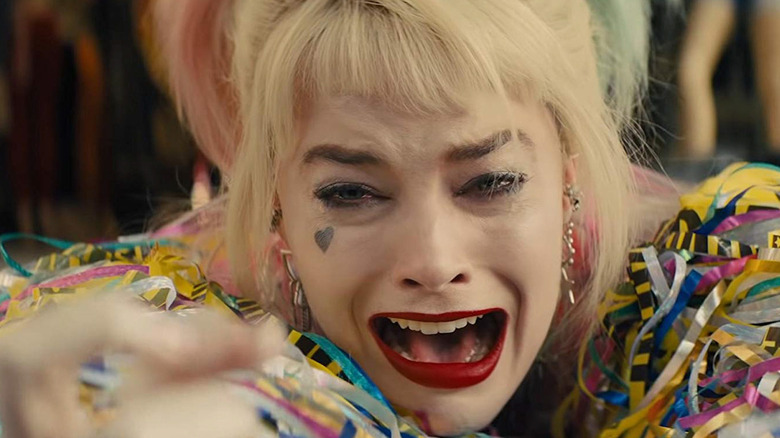 Harley Quinn (Margot Robbie) screams in agony over the loss of her egg sandwich in 