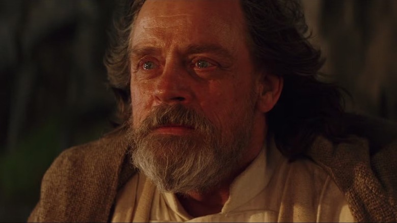 A close-up of Luke Skywalker staring intensely in Star Wars: The Last Jedi